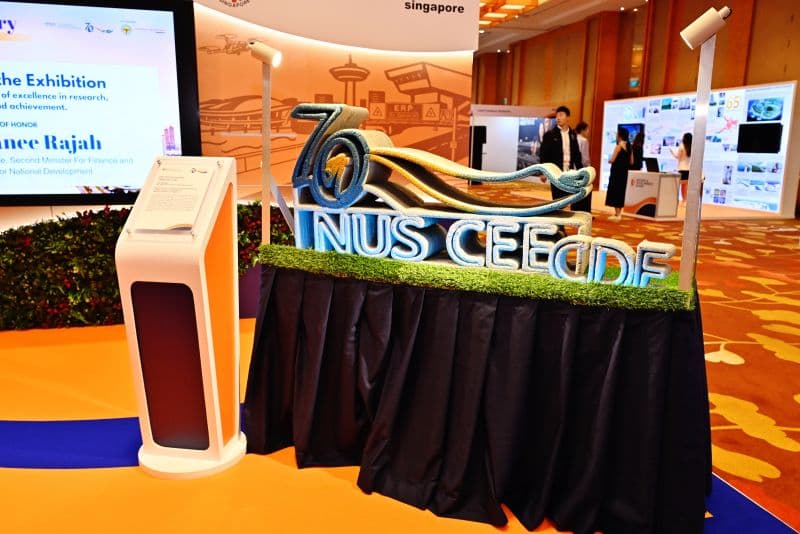 Registration counters and check-in kiosks at a conference in Singapore